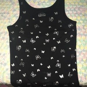 Lightly used tank top with installed bra